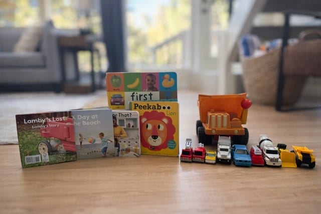 Children's books and toy vehicles available for young guests